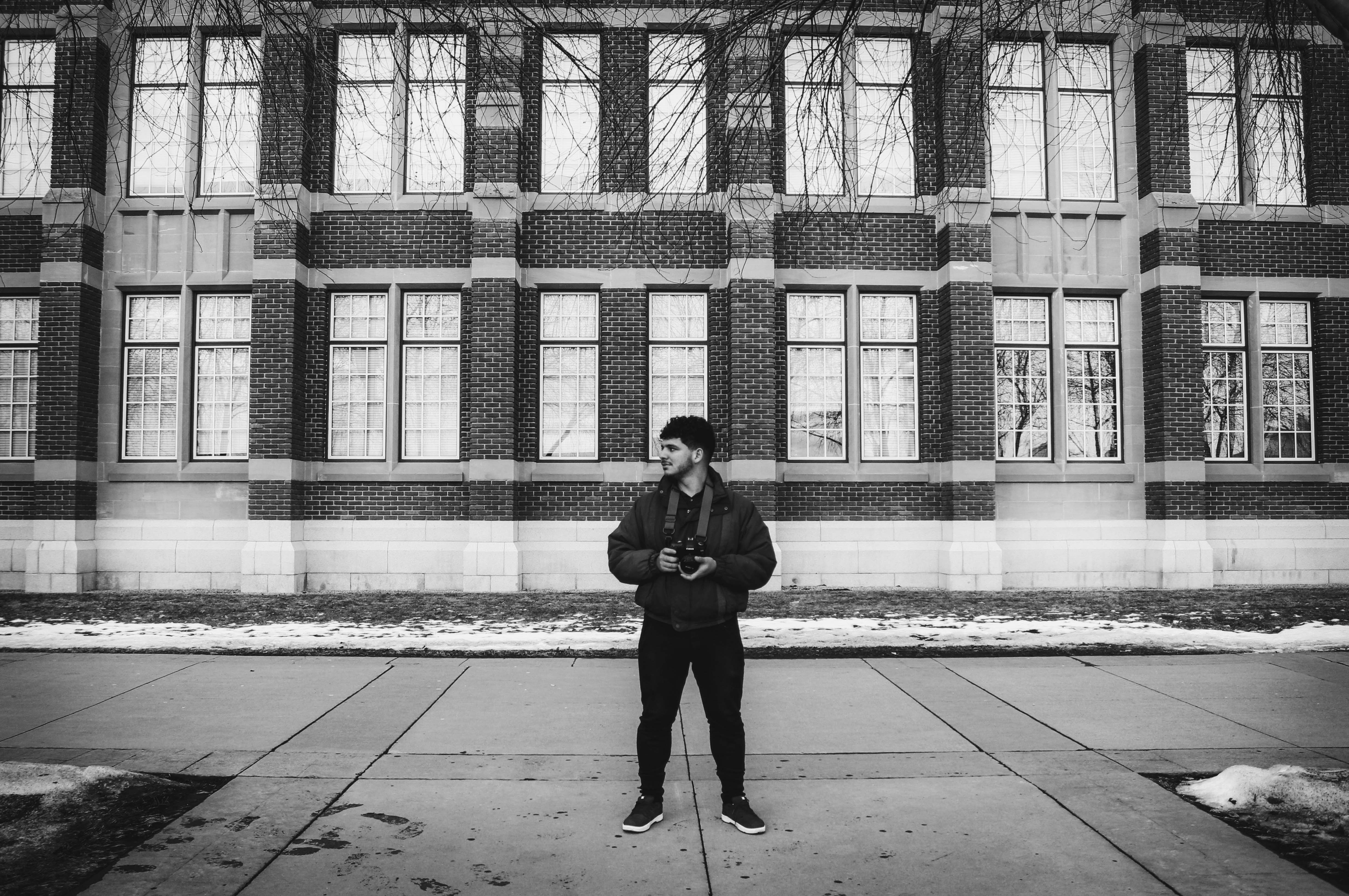 Juan posing for an in-class exercise in PHOT256 on SAIT campus in Calgary on Tuesday, Jan. 21, 2020. Pictures are shot from different positions for the same subject. (Photo by Meng Wei/SAIT)